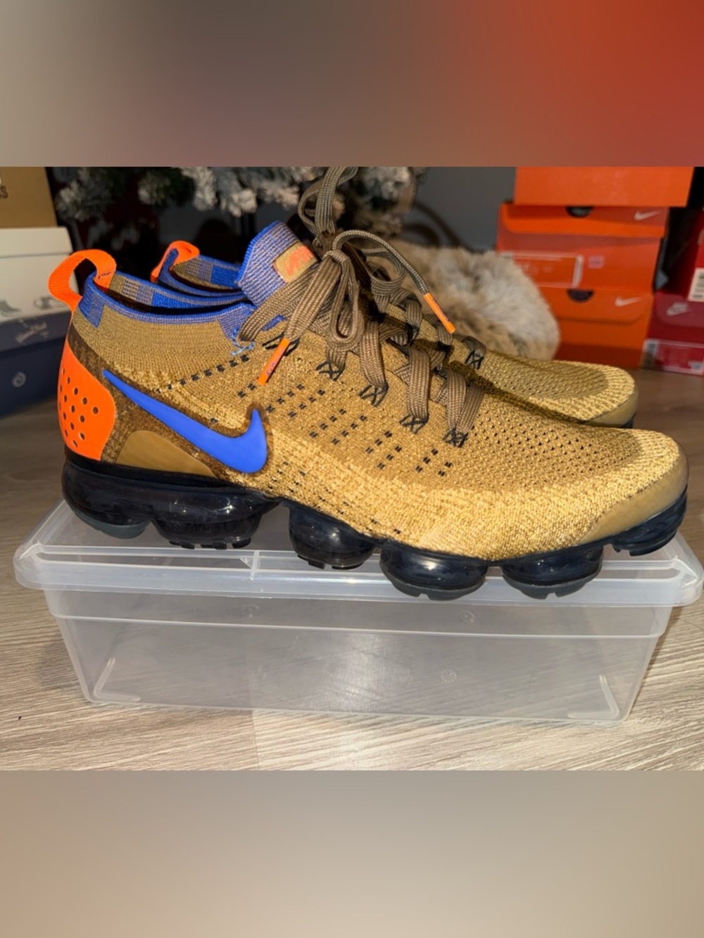 Nike Gold Flyknit VaporMax with Blue Swoosh